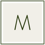 Monogram M in dark green on a pale beige background
